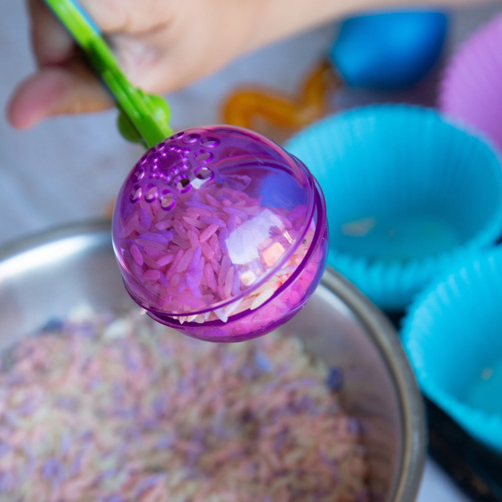 Sensory play with rice and fine motor tools