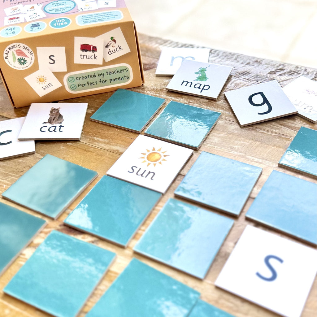 Initial Sounds matching game tiles on table with box