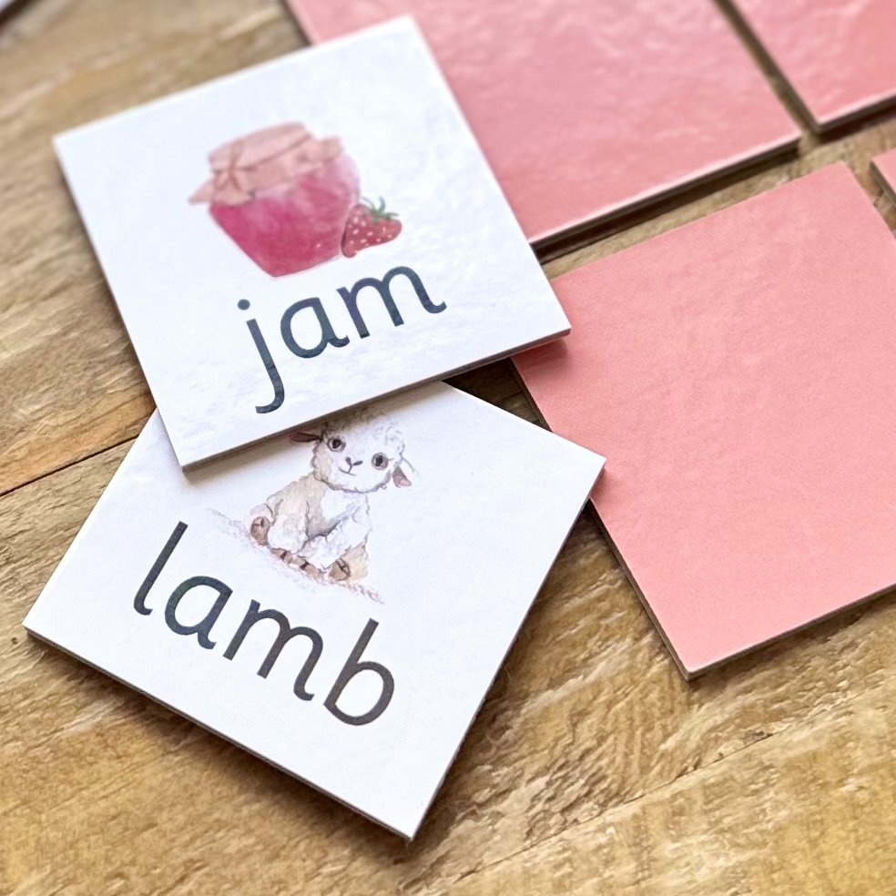 Rhyming pairs tiles with the words jam and lamb. 